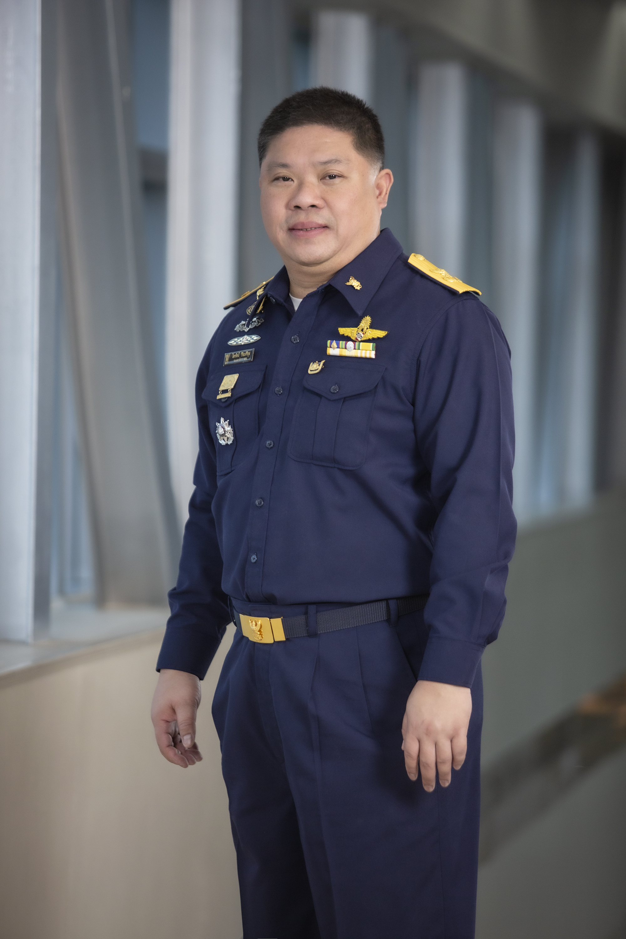 ภาพรักษาการเลขาธิการ-กสทช-นายไตรรัตน์-เครื่องแบบน้ำเงิน.jpg